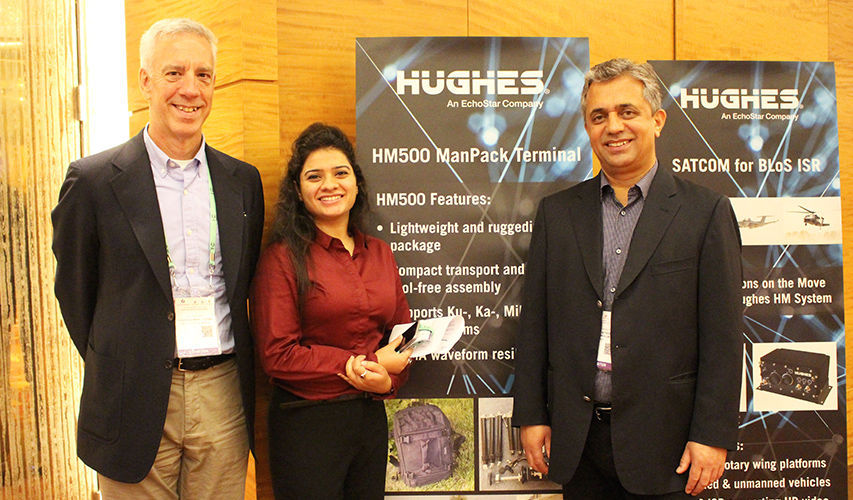 Dave Rehbehn with Swati Ghandi, a sales engineer based in Gurgaon India, and Pranav Roach, president of Hughes India
