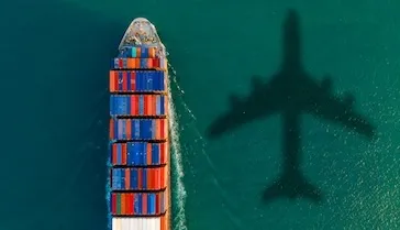 A boat and an airplane shadow 