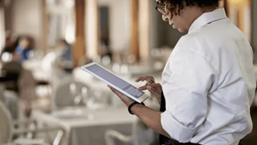 restaurant server on tablet