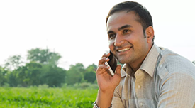 A person on their phone outdoors