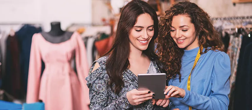 retail_customers_looking_at_tablet