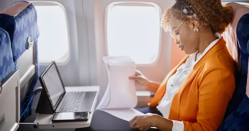 Woman on Wi-Fi in plane