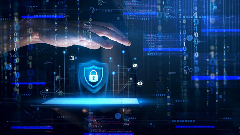 A digital illustration of a hand hovering over a glowing tablet that displays a blue security shield with a padlock icon