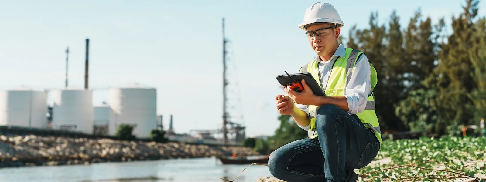 Construction worker looking at a tablet