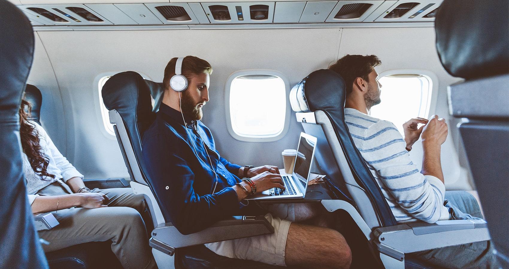 People on plane using WiFI