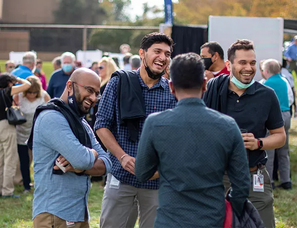 hughes employees talking 