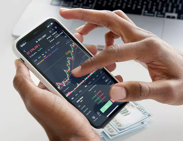 person scrolling through financial app