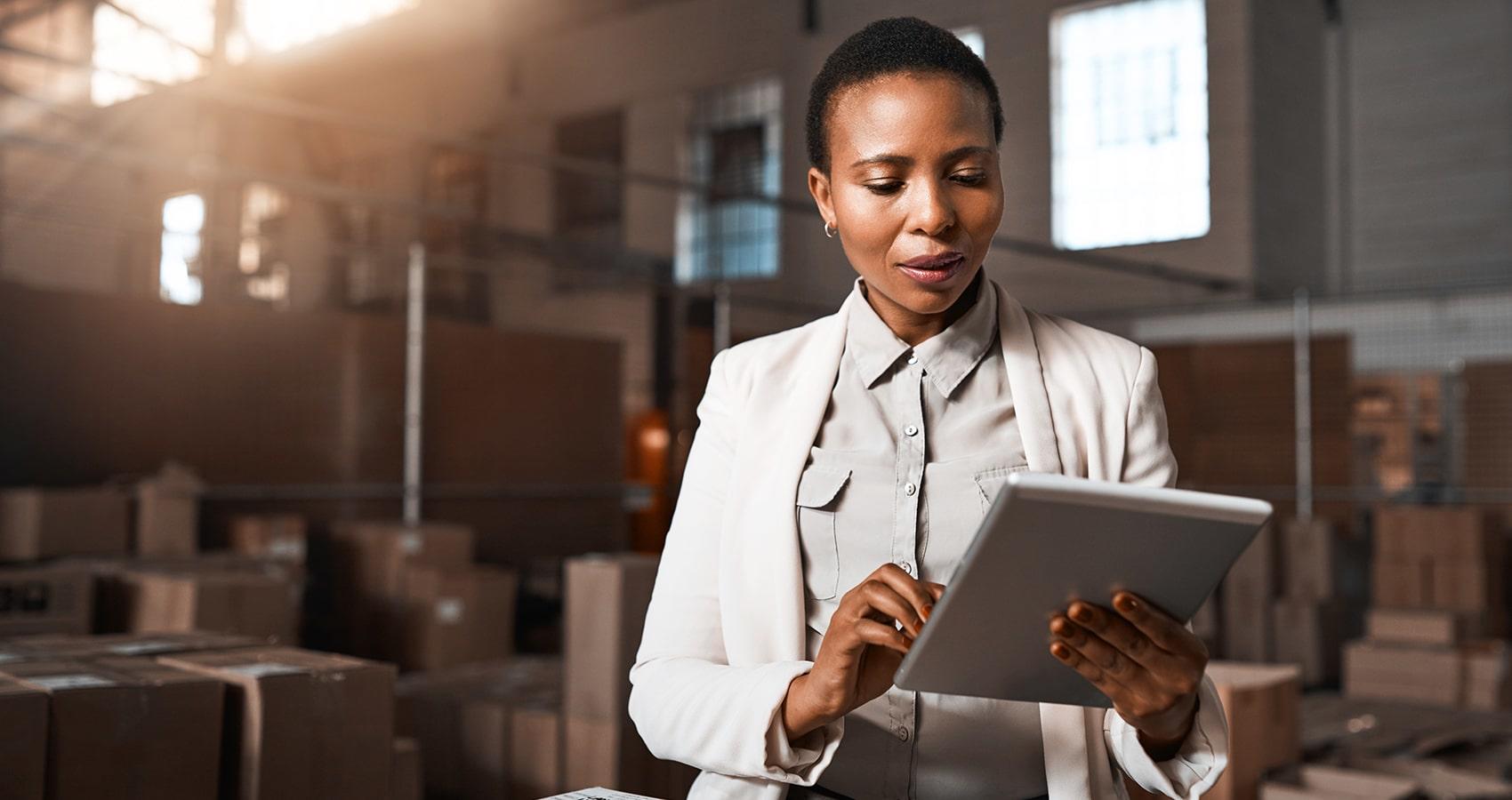 Image of business woman holding tablet