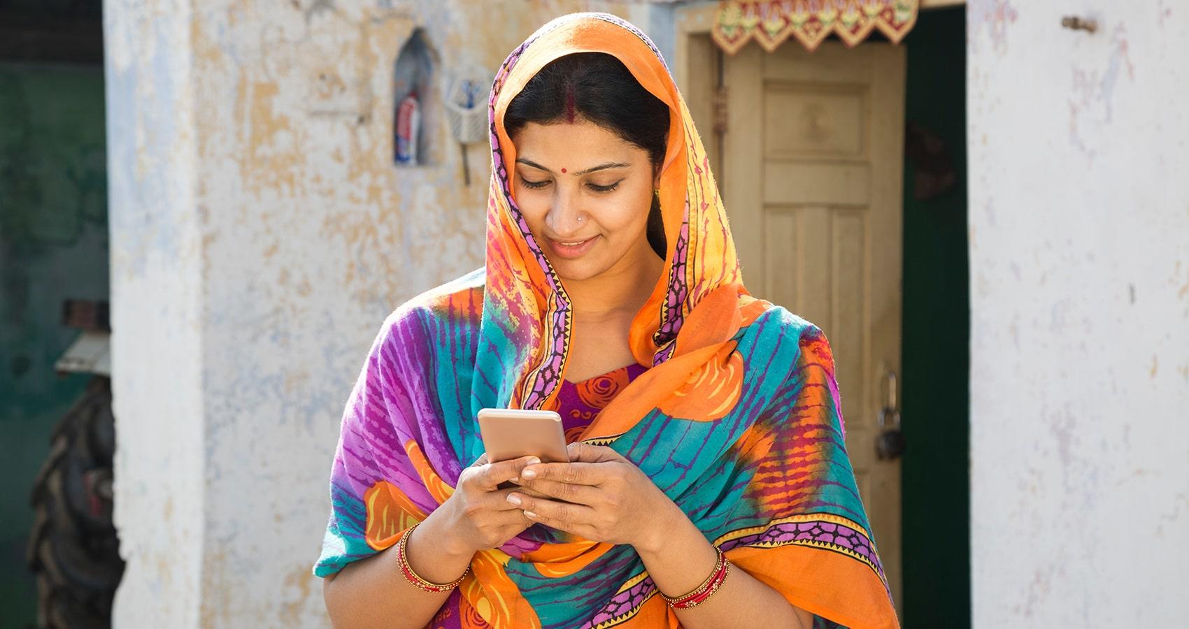 image of Indian woman on cell phone