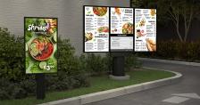 Drive thru menu displaying salads, wraps, sandwiches, and drinks
