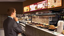man_looking_at_digital_menu