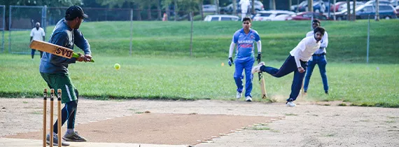 hughes employees playing baseball