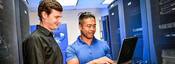 hughes employees in server room