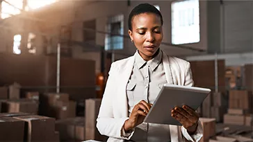 woman holding tablet