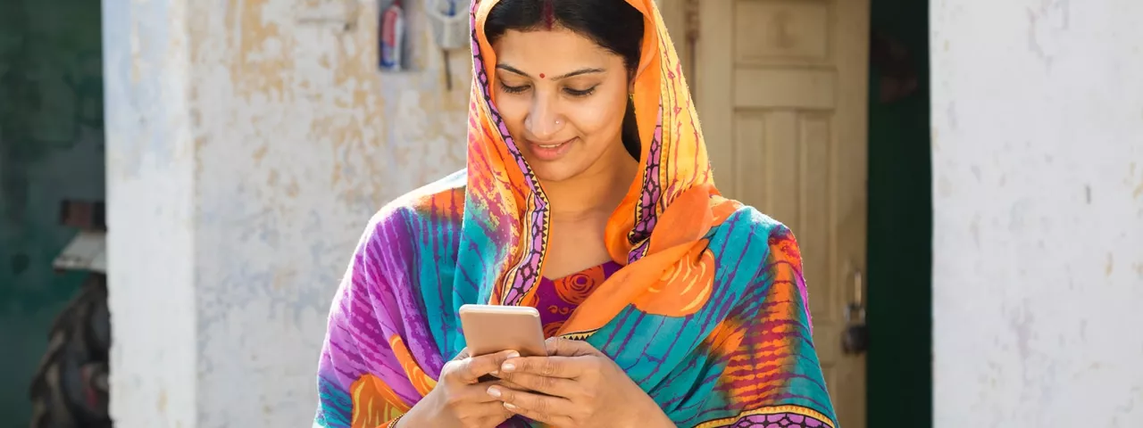 image of Indian woman on cell phone