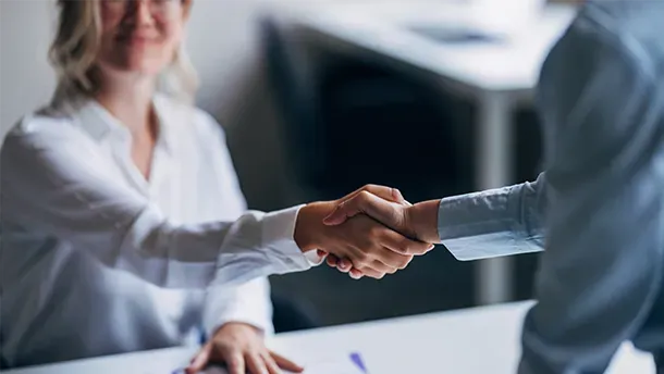 Two people shaking hands