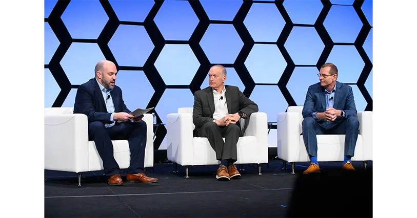 Jeffrey, Paul, and Glenn participating in a fireside chat during SATELLITE 2024